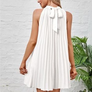 Pleated twirl dress